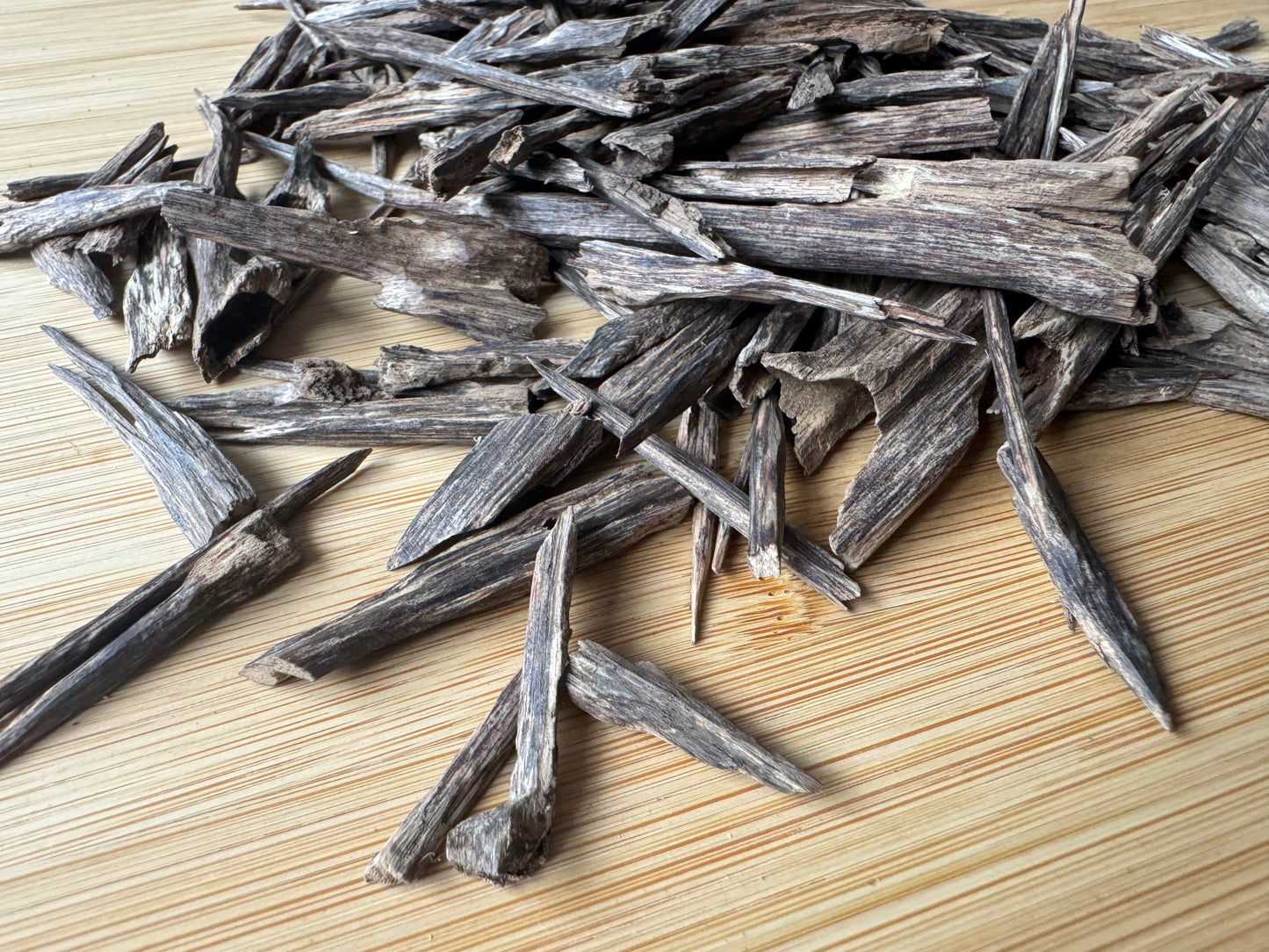 Wild Hindi Agarwood chips on a table