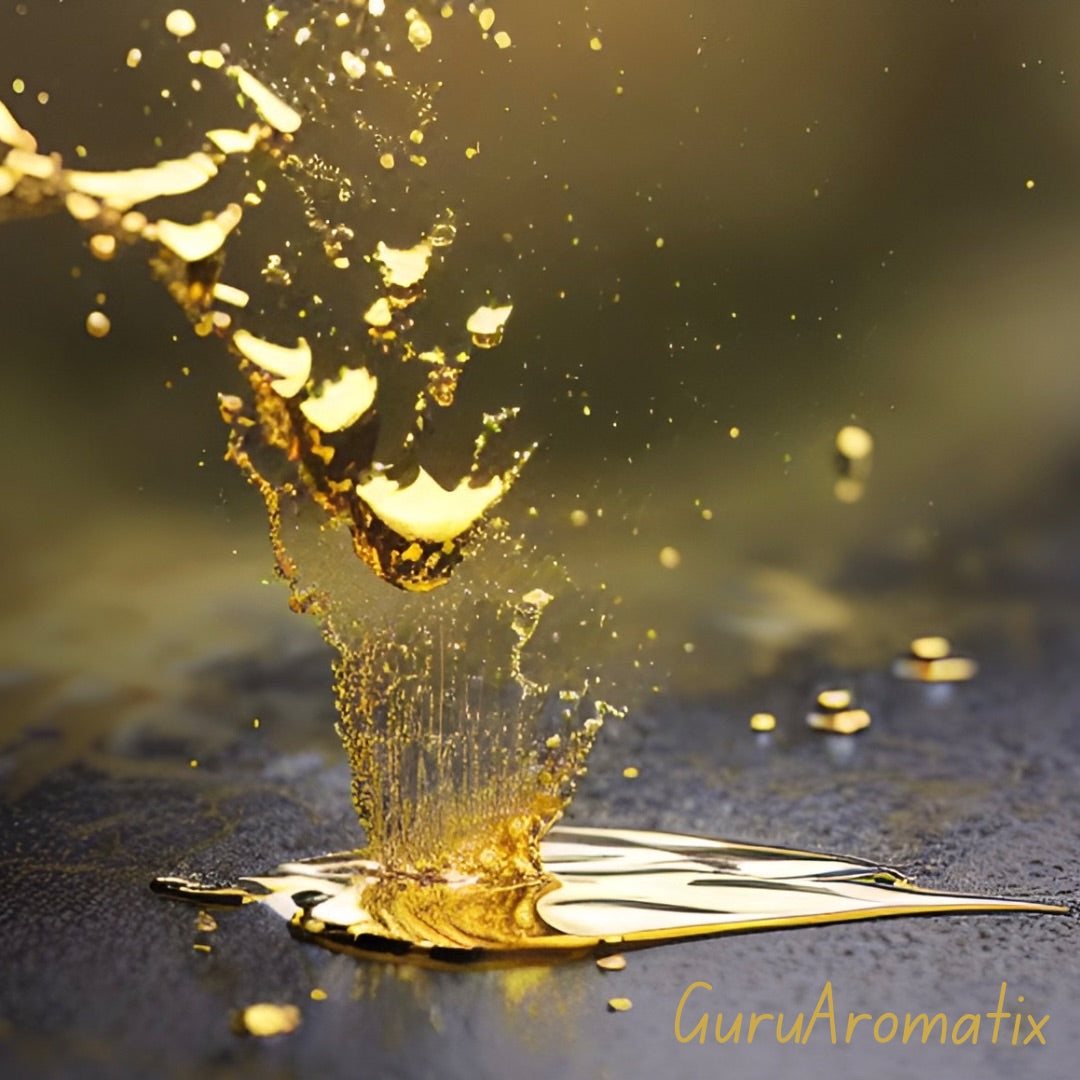 Logo of Wild Sri Lanka Sandalwood Oil. Picture of liquid gold dropping on the ground