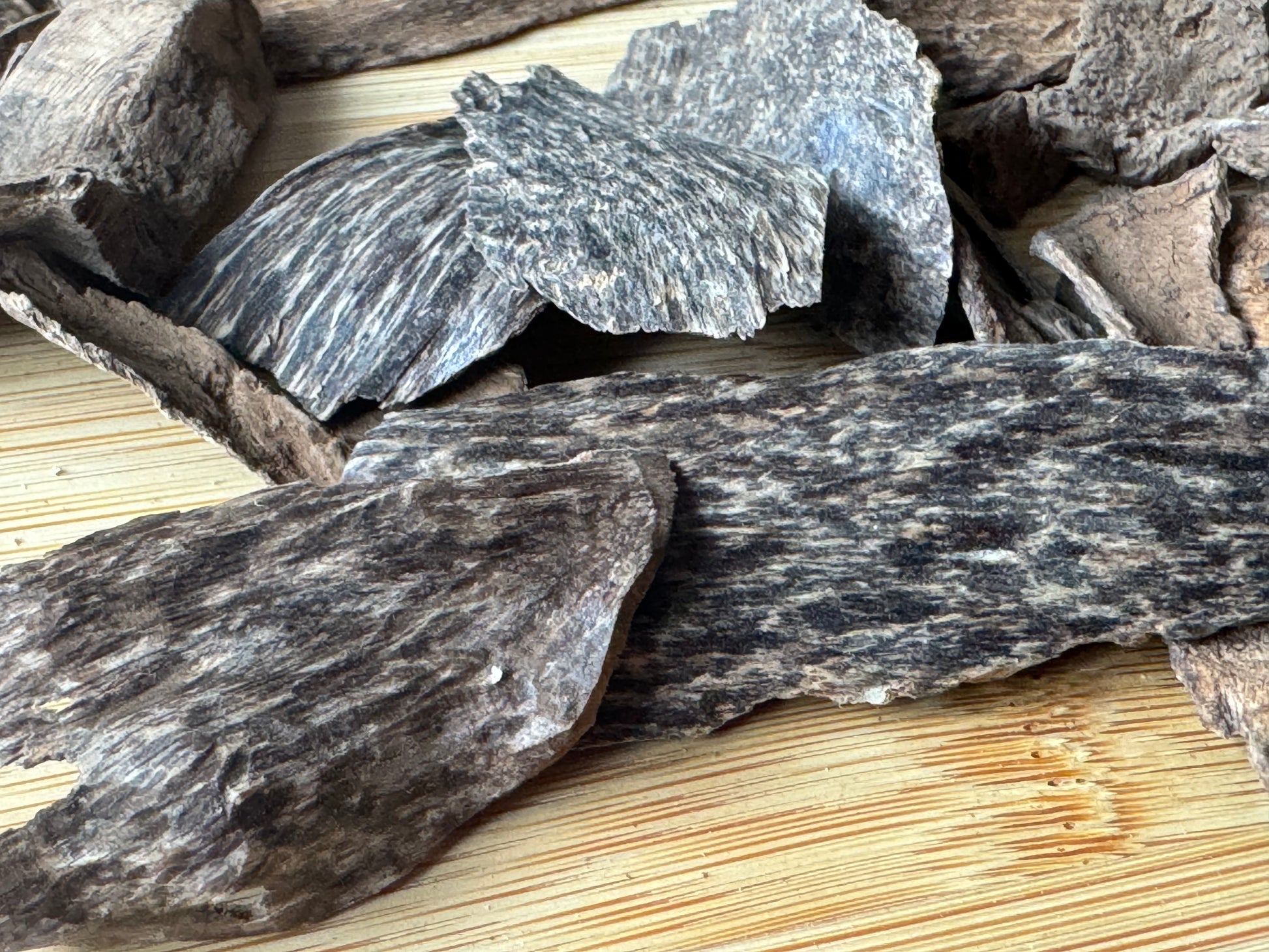  sri Lanka Agarwood chips on a wooden table