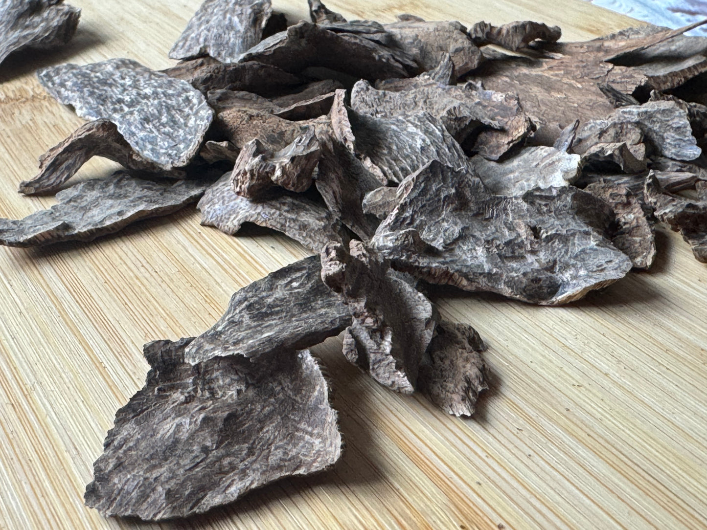 Wild sri Lanka Agarwood chips on a wooden table