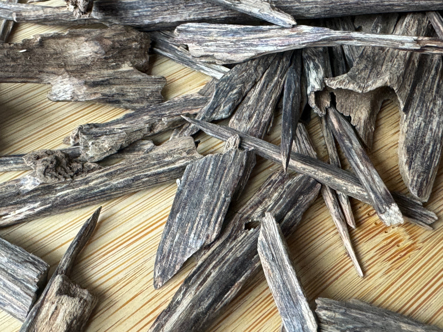 Wild Hindi Agarwood chips on a table 