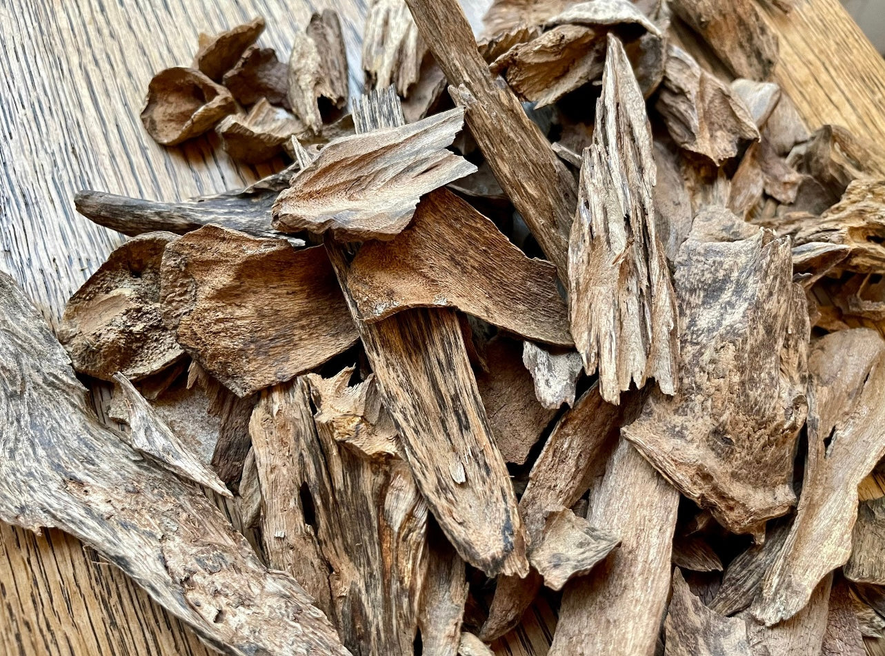 Many pieces of Papua Agarwood on a table