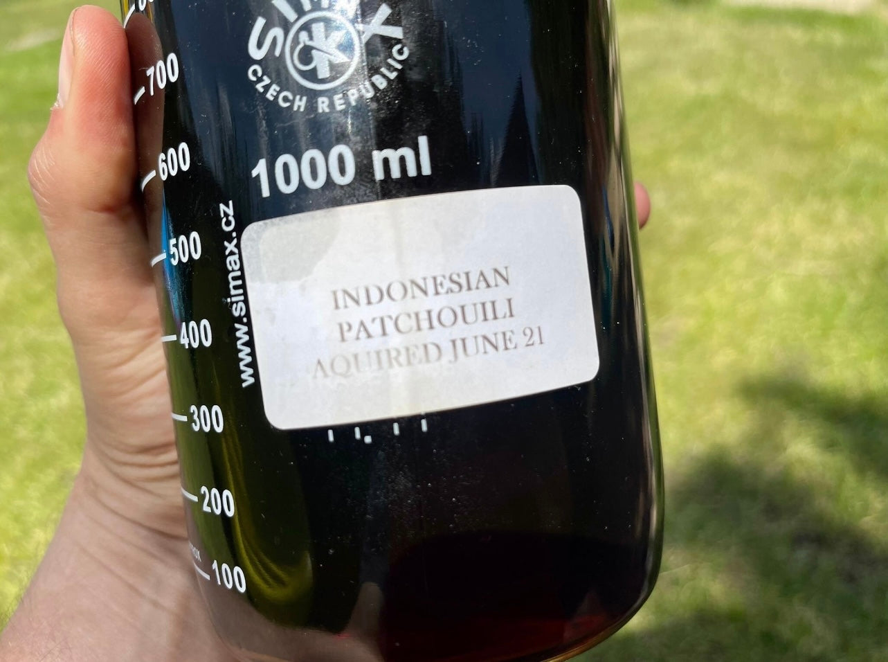 A large bottle of Indonesian patchouli oil