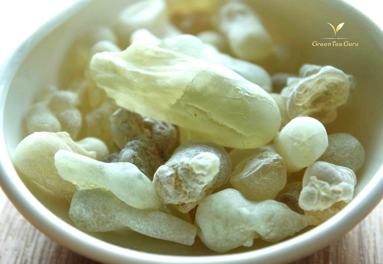 Close up of Royal Green frankincense in a cup on the table