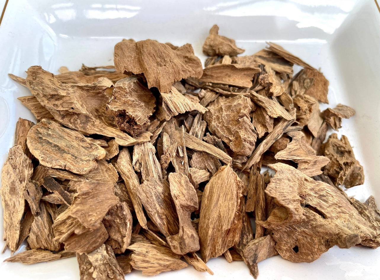 Many pieces of Agarwood on a tray on the table