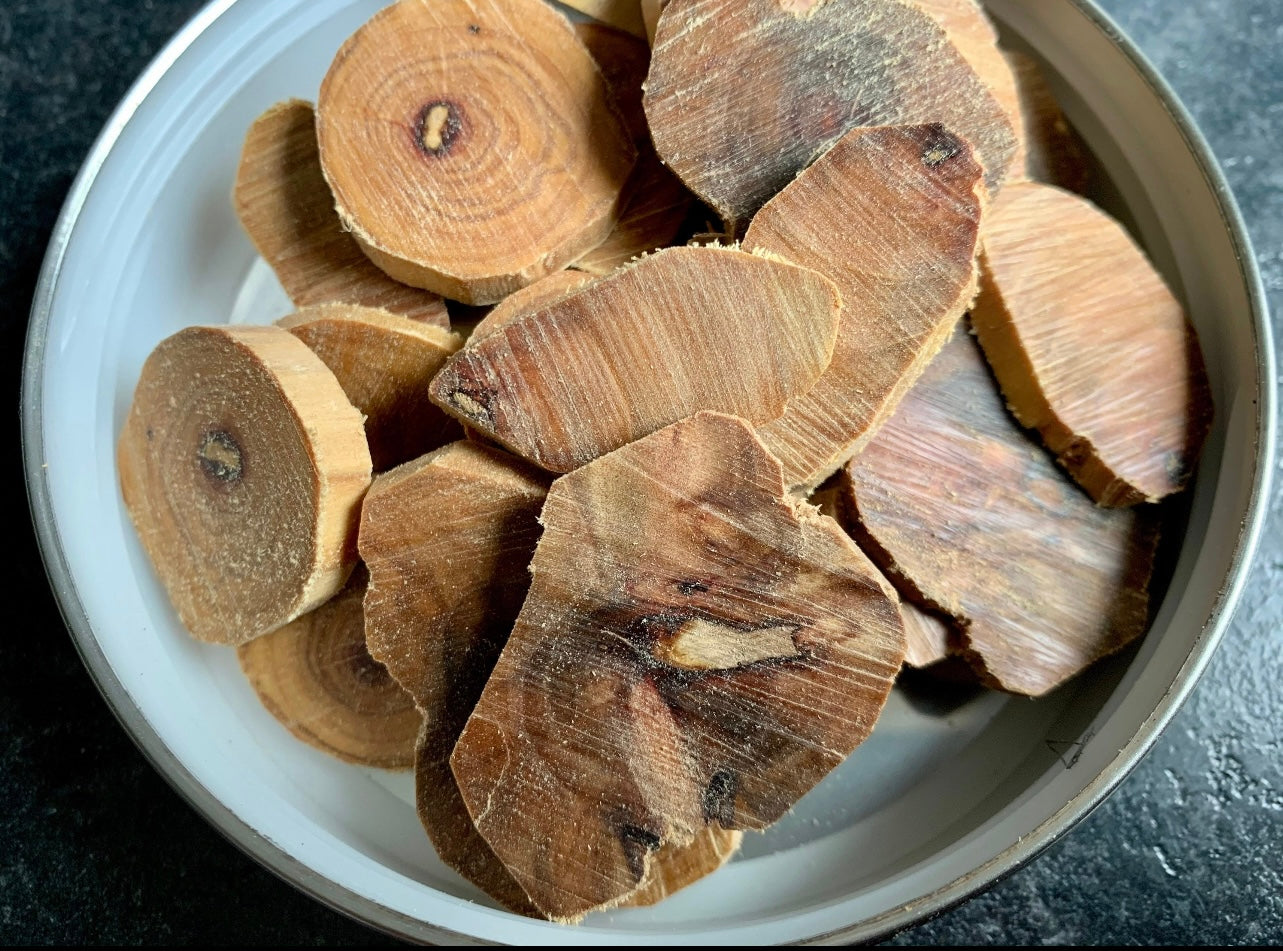 Sinking grade Sandalwood chips in a jar